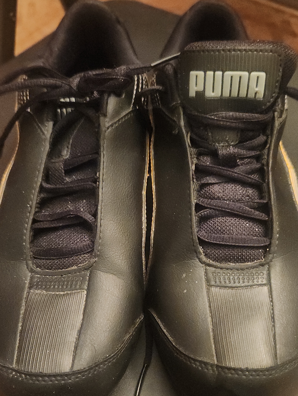 Puma Men’s Black and Gold Low-Top Sneakers
